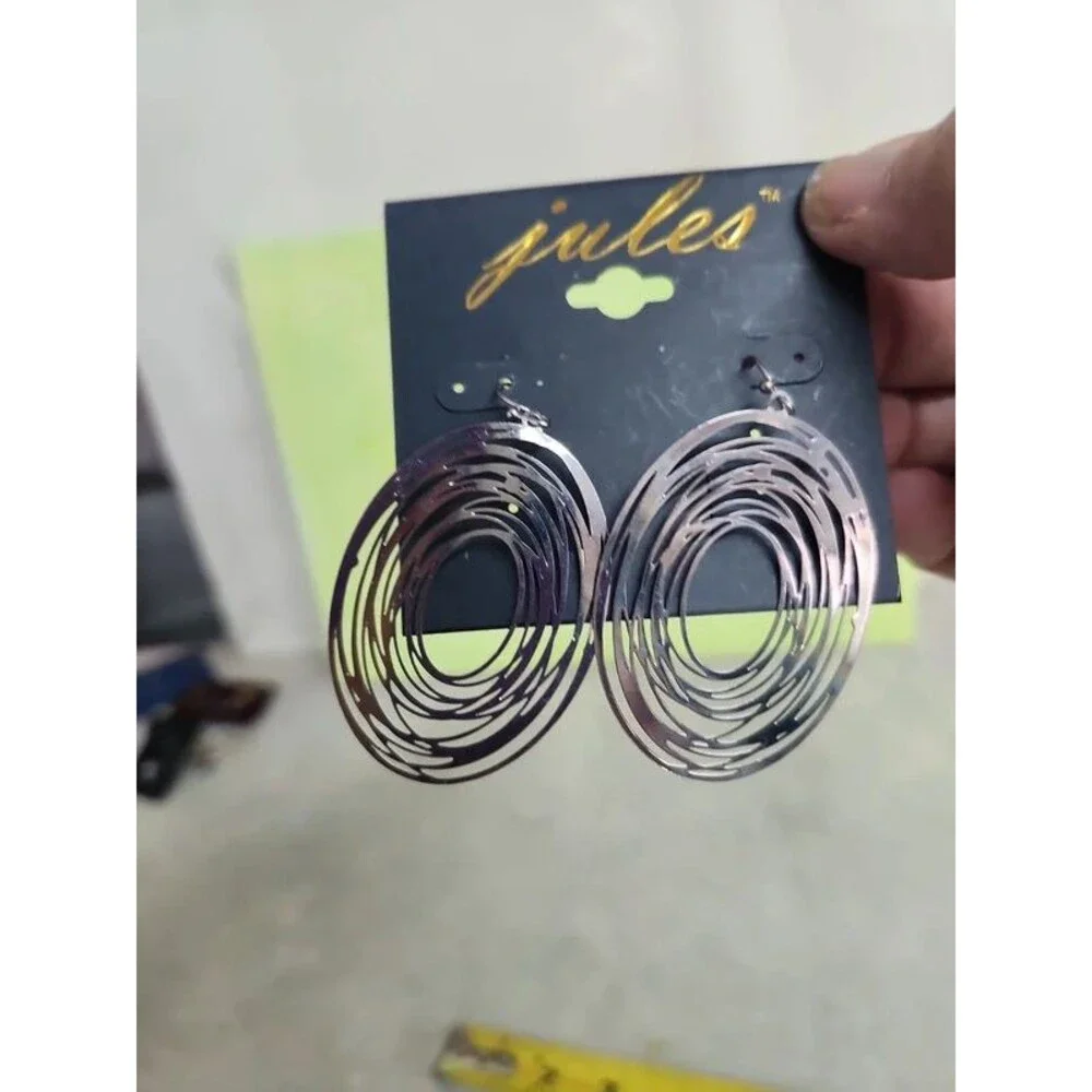 cosmic design earrings by Jules